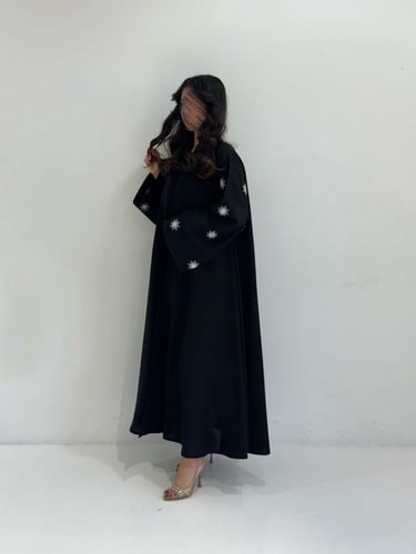 كتان مطرز شمس أبيض