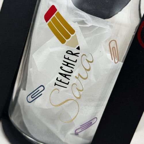 كأس زجاجي للمعلم