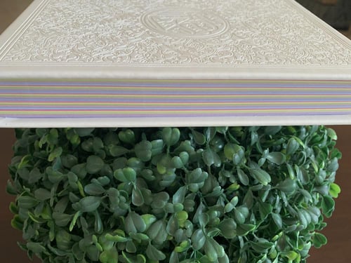 مصحف أبيض مع باركود