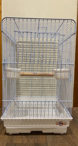 White-colored cockatoo cage with two doors