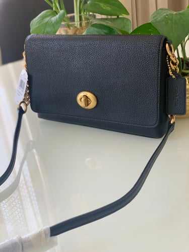 شنطة نسائية من كوتش