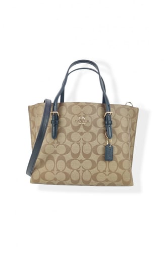 شنطة نسائية من كوتش