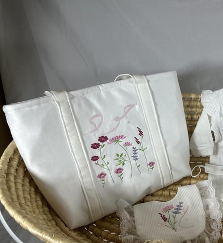 شنطة مواليد بتطريز الاسم