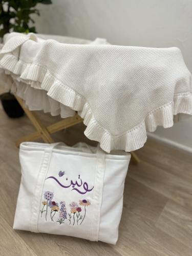 شنطة مواليد بتطريز الاسم