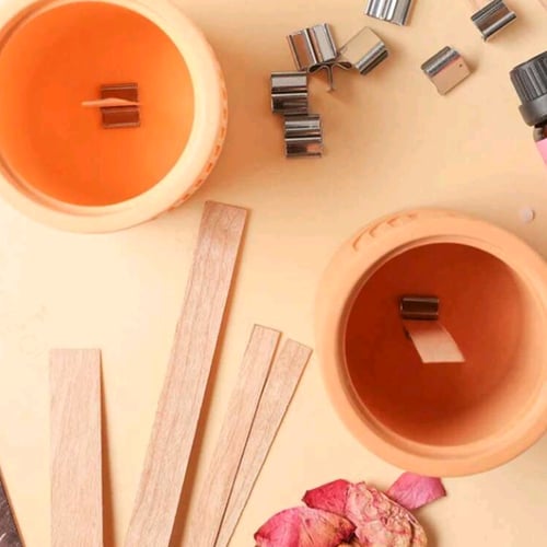 «قاعدة حديد لفتيل الخشب»