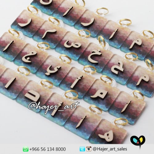 ميدالية حرف - بنقش