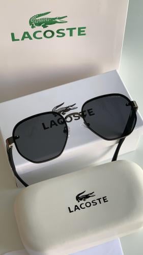 ‏نظارة لاكوست اسود مع ملحقاتها