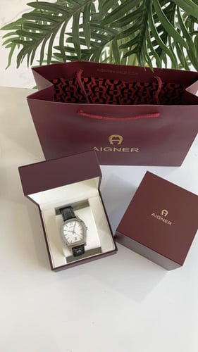 ساعة اقنر رجالي اسود مع ملحقاتها