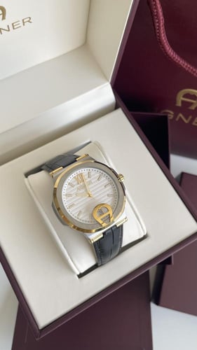 ‏ساعة اقنر جلد أسود مع الملحقات