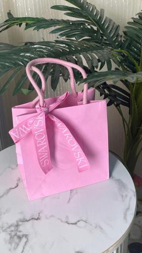 كيس سوارفسكي وردي وسط