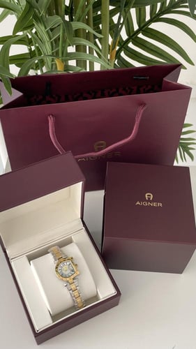 ساعة اقنر ذهبي مع فضي مع الملحقات