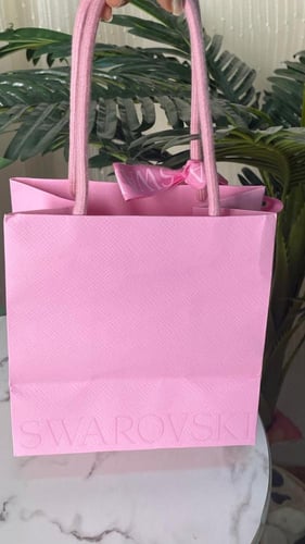 كيس سوارفسكي وردي وسط