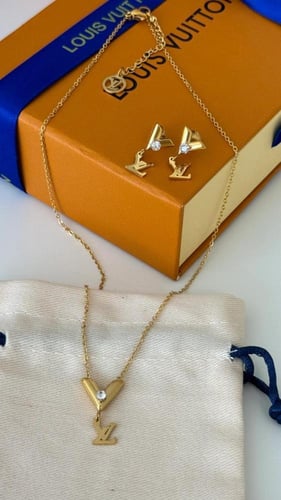 ‏سلسال وحلق LV