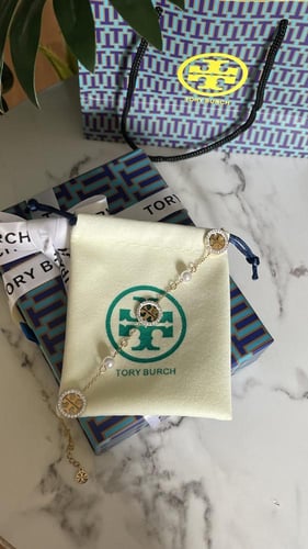 اسورة توري بورش ذهبي مع لؤلؤ شامل ملحقات