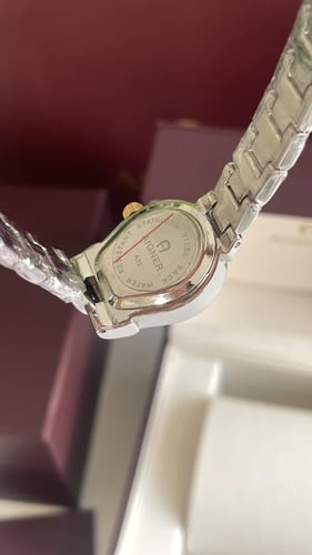 ساعه اقنر فضي مع ذهبي حجم صغير شامل ملحقاته