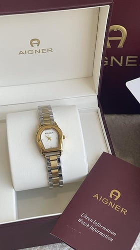 ساعه اقنر نسائي فضي مع ذهبي مع ملحقاته