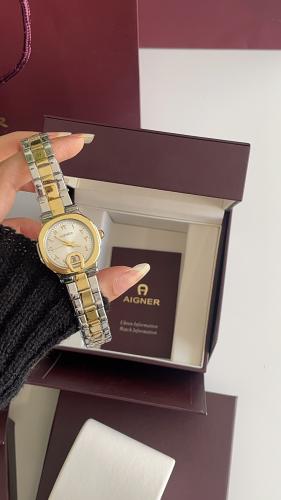 ساعة اقنر نسائي ذهبي مع فضي مع ملحقاته