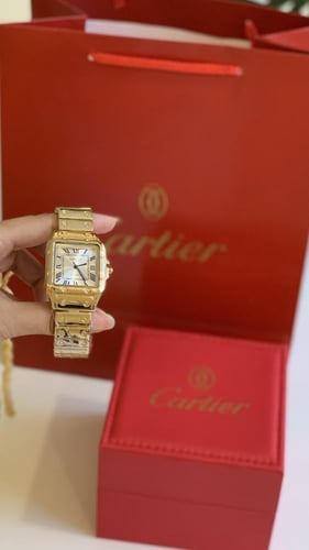 ساعة كارتير نسائي ذهبي مع ملحقات