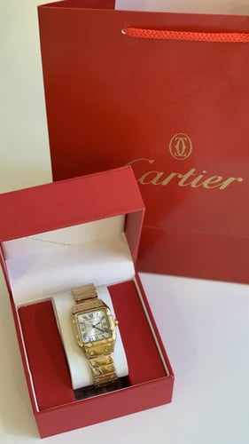 ساعة كارتير نسائي ذهبي مع ملحقات