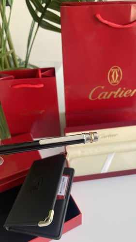 بكج قلم ومحفظه اسود بطاقه كارتير