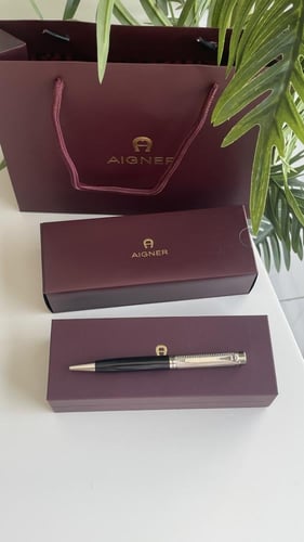 قلم اقنر فضي مع اسود مع ملحقاته