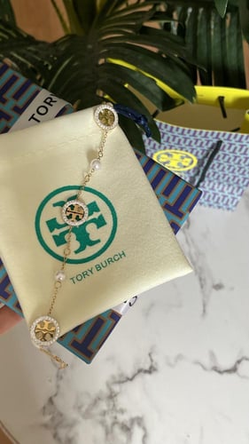 اسورة توري بورش ذهبي مع لؤلؤ شامل ملحقات