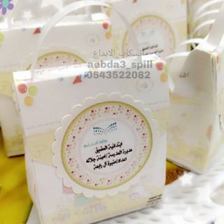 درزن توزيعات حقيبة مدرسية صغيرة