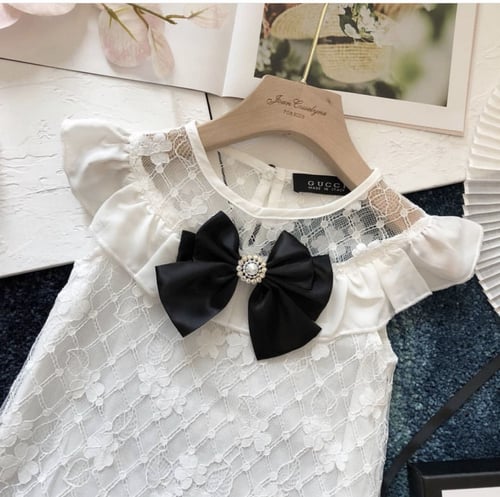 فستان دانتيل مزين ببروش كريستال +قبعة من قوتشي