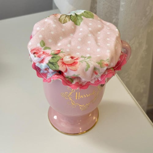 أغطيه أكواب او علب