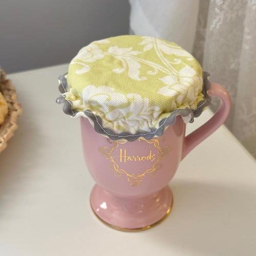 أغطيه أكواب او علب