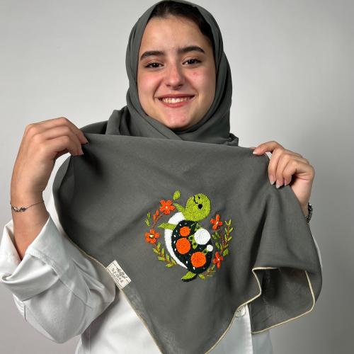 طرحة بوال باللون الزيتي " الاسمنتي " بتصميم السلحف...