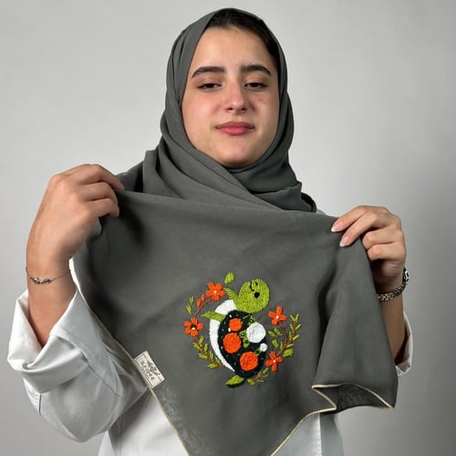 طرحة بوال باللون الزيتي " الاسمنتي " بتصميم السلحف...