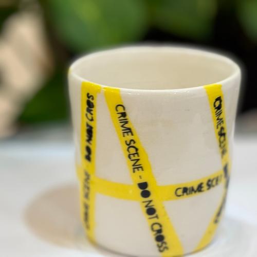 كوب شريط مسرح الجريمة