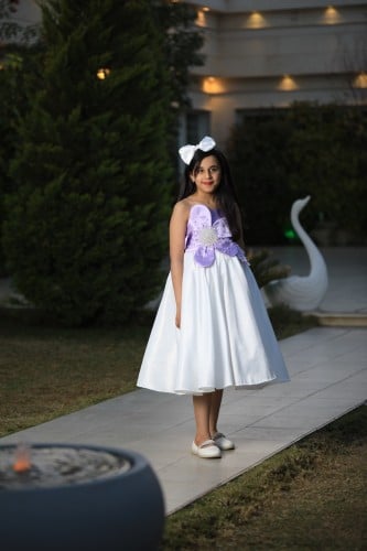 فستان أطفال مشكوك من عمر ٥ سنوات