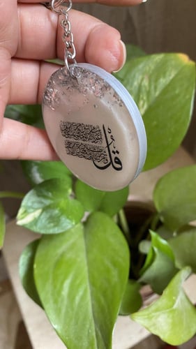 تعليقة مفتاح قل بحواف فضيه