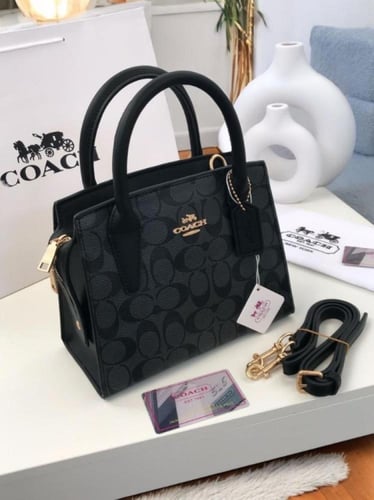 شنطة ماركة كوتش ماستر كواليتي معا ملحقاتها