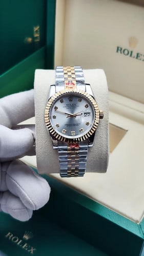 ساعة رولكس رجالي مقاس 36 بطارية