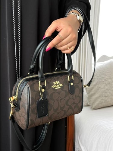 شنطة كوتش نسائية ماستر معا ملحقاتها