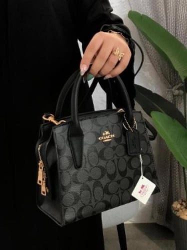 شنطة ماركة كوتش ماستر كواليتي معا ملحقاتها