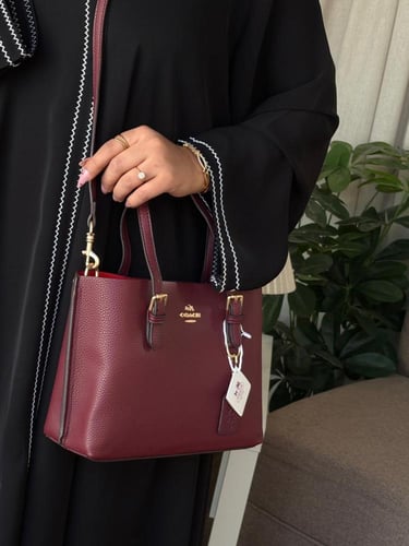 شنطة كوتش نسائية ماستر معا ملحقاتها