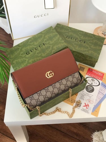 شنطه جوتشي هاي كواليتي معا ملحقاتها