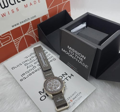 ساعة اوميجا رجالي فخمه معا ملحقاتها