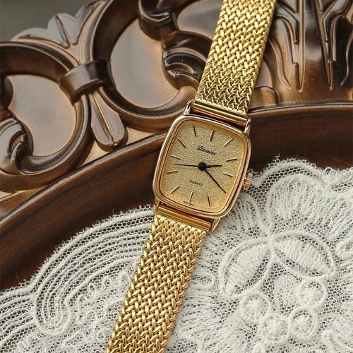 ساعة مطليه بذهب عيار24