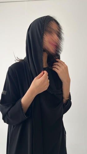 عباية برَّاقة