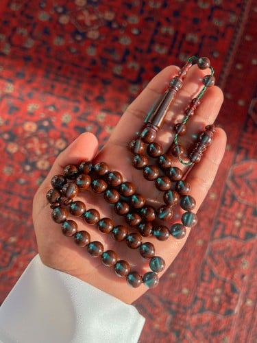 بكلايت بني/زيتي شفاف