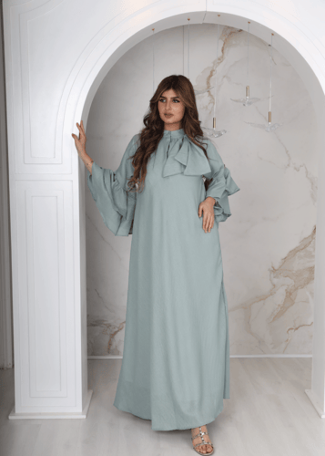 فستان استقبال تركوازي بأكمام طبقات