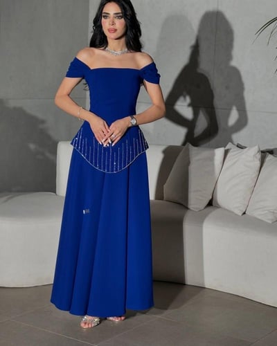 فستان باربي لون نيلي