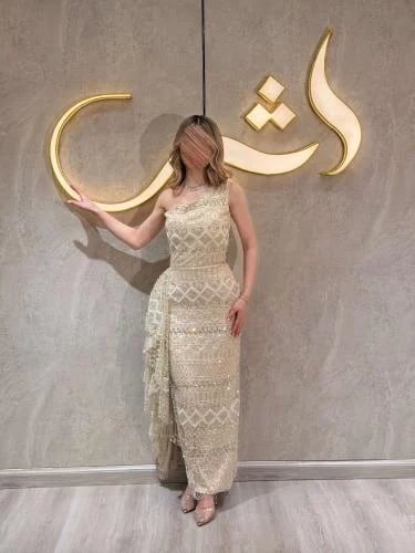 فستان بوني / نعومة البيج تتزين بفخامة التطريز