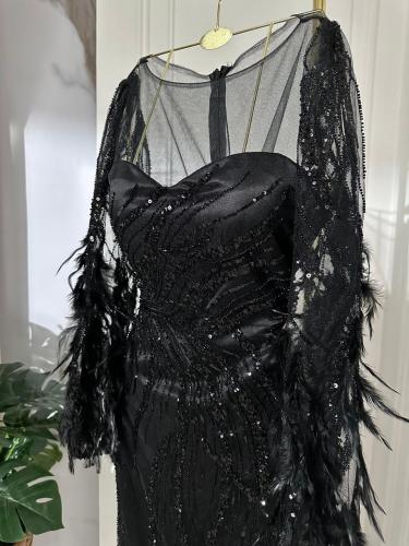 فستان مطرز بريش