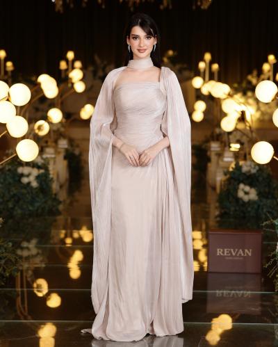A luxurious evening dress with flowing sleeves from Rivan